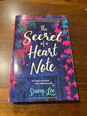 The Secret of a Heart Note by Stacey Lee - Vibrant Blue & Pink Cover